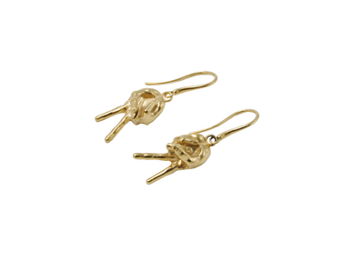 Peace and love earrings inspired by Frida Kahlo's , made by SHAWE jewelry in sterling silver and gold plated for Frida Kahlo x SHAWE new collection 